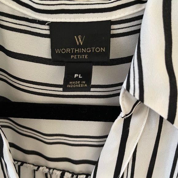 This blouse is white with black vertical stripes.  It’s a little bit sheer. - Picture 2 of 5